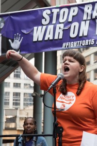 Paige Warren, worker at Loyola University and SEIU Local 73 member, inspiring the crowd as emcee at the Thompson Center. 
