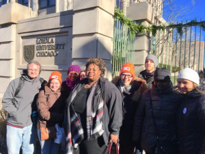 Graduate student employees with the Loyola Worker Coalition and healthcare workers of SEIU Healthcare joining forces to reject Trump's Tax plan. 